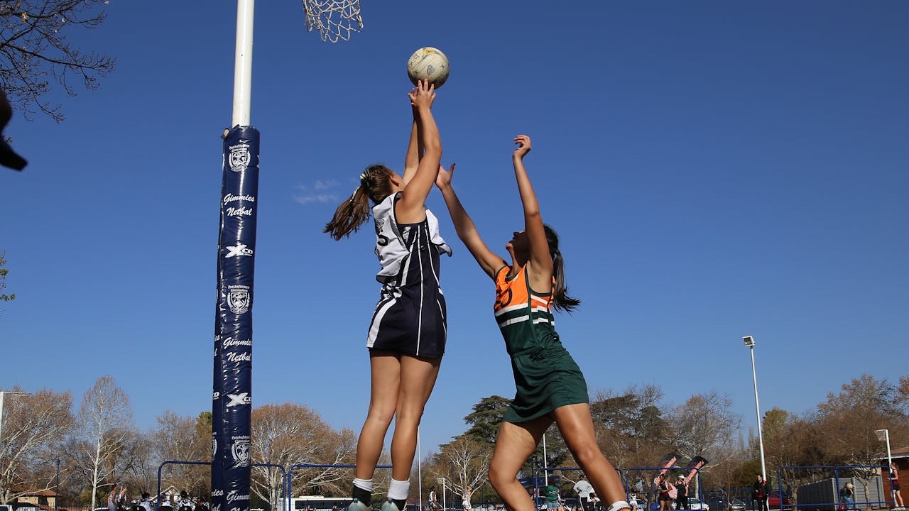 Pupils playing in a netball league