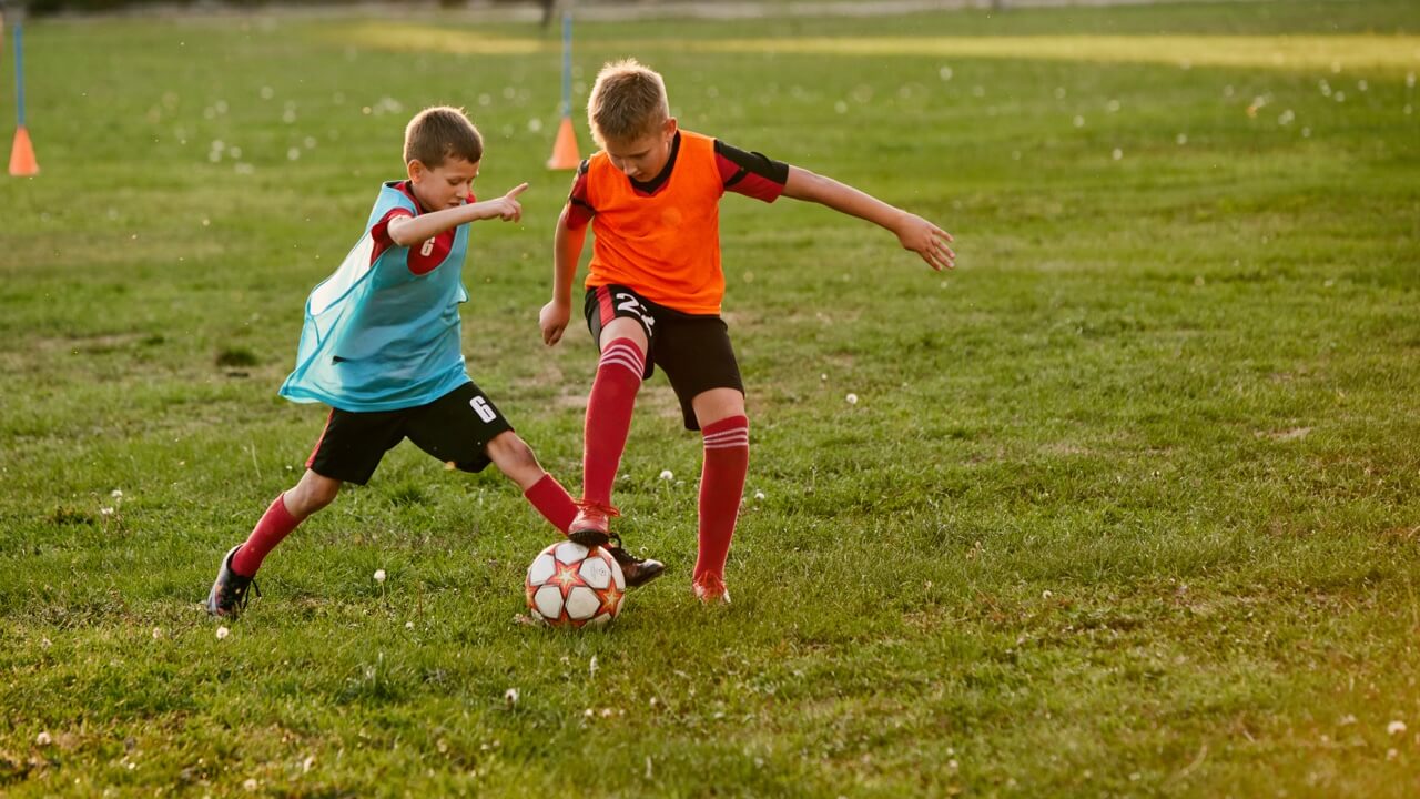 Pupils playing in a football league
