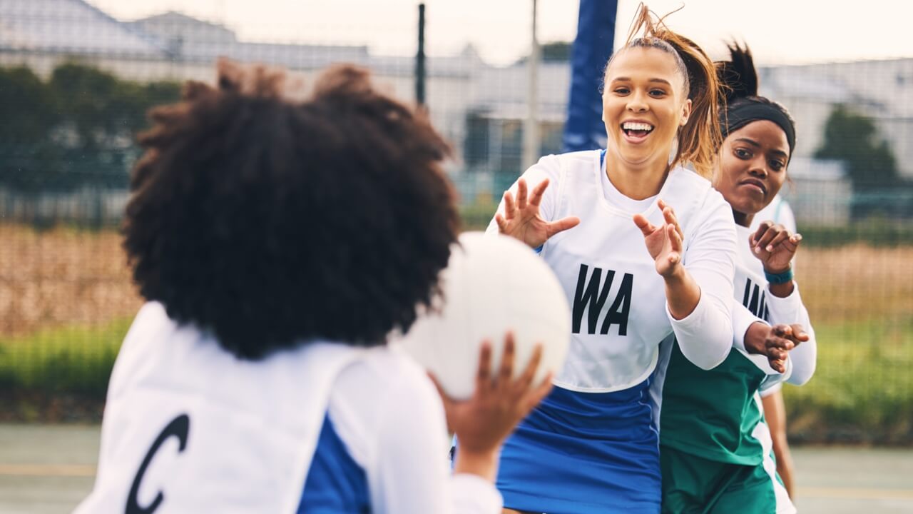 Pupils playing in a netball league